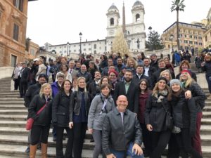 Choir members pose on the Spanish Steps in Rome.