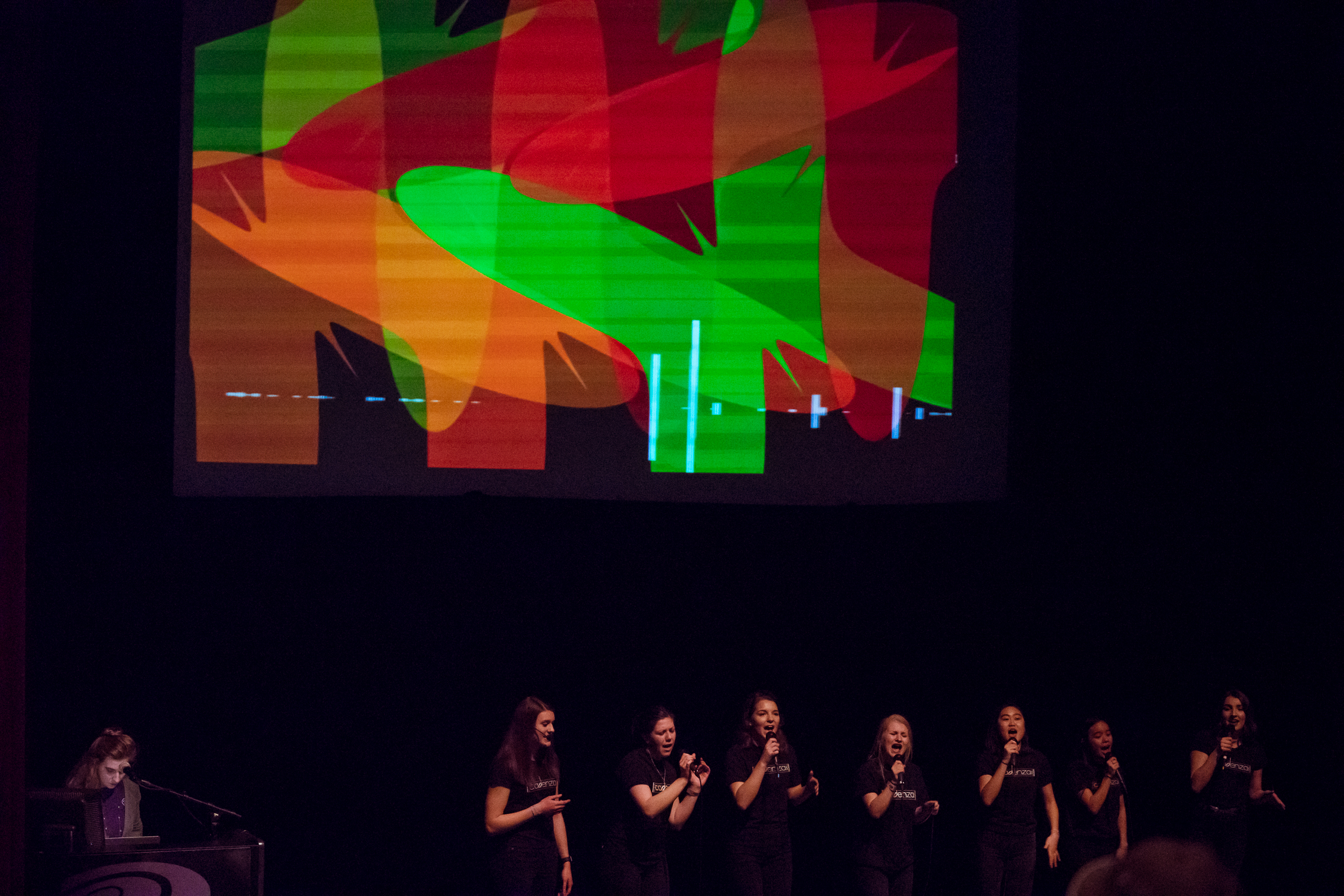 Members of St. Thomas' singing group "Cadenza" perform at the Science Museum of Minnesota during a recent Code and Chords performance.
