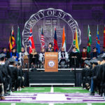 Divine Zheng gives the student address during the 2018 Undergraduate Commencement ceremony in O'Shaughnessy Stadium on May 18, 2018 in St. Paul.