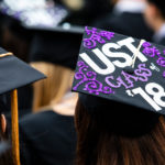 A motarboard cap reads "UST Class of '18" during the 2018 Undergraduate Commencement ceremony in O'Shaughnessy Stadium on May 18, 2018 in St. Paul.