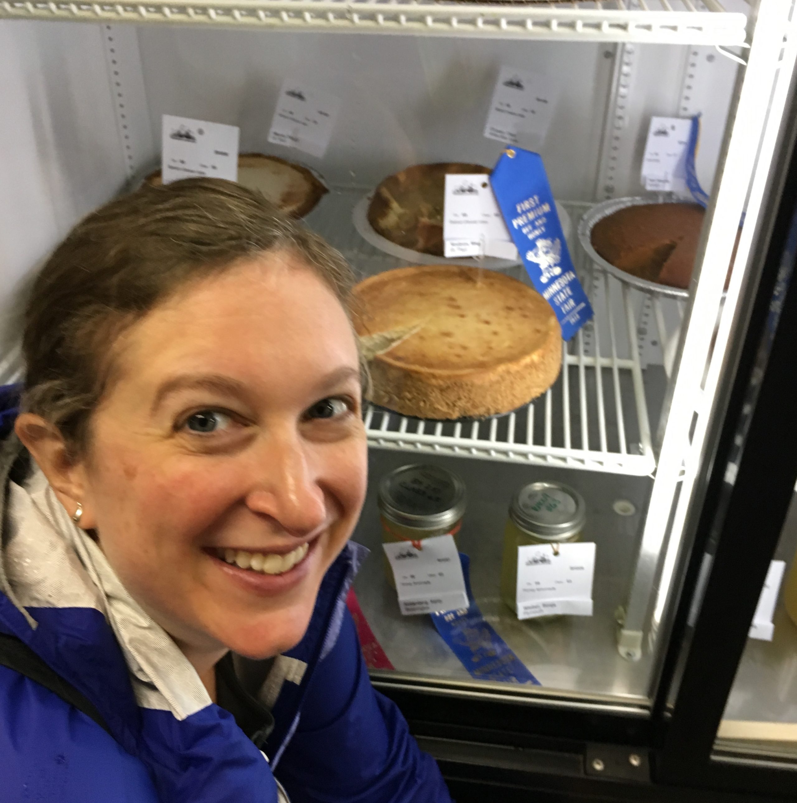 Meg Nodzon '99 poses with one of her blue ribbon-winning baked goods.