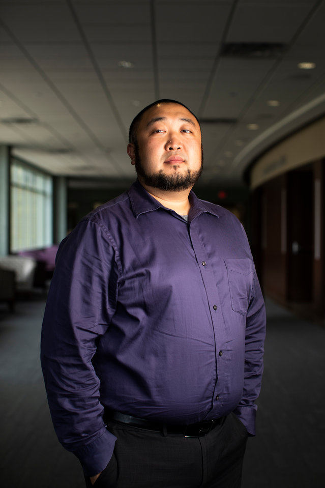 Portrait of MIC staff Ed Kim outside of the James B. Woulfe Alumni Hall in the Anderson Student Center during the Proud To Be First reception on Aug. 31, 2018.