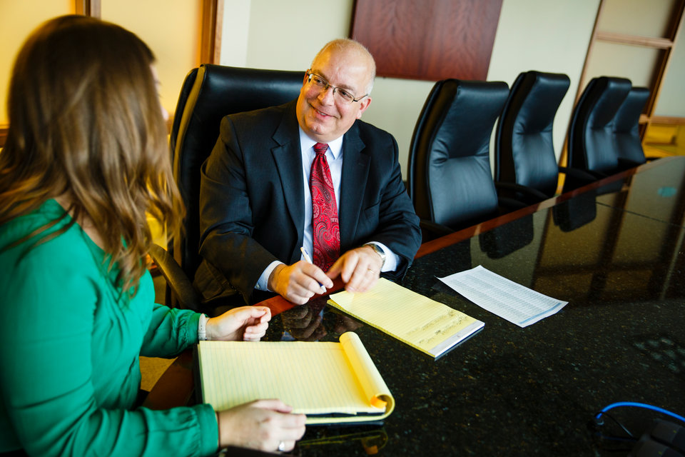 School of Law student Katherine (Katie) Grohs (left) meets with her mentor Thomas (Tom) Hanson of the Winthrop and Weinstein firm February 23, 2016 at the Winthrop offices in the Capella Tower in Minneapolis.