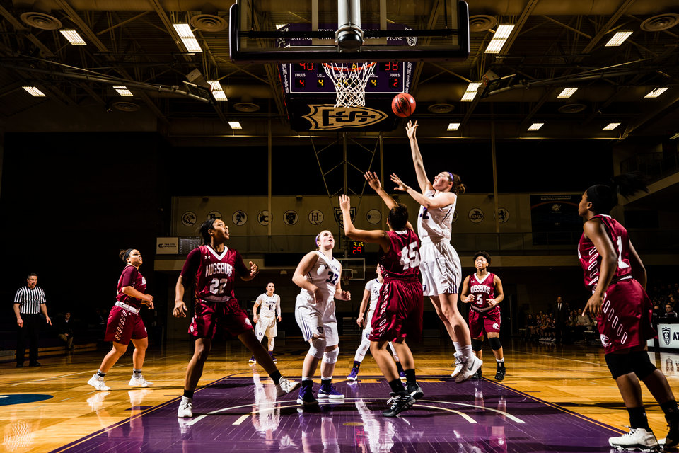Hannah Spaulding shoots over a defender during a women's basketball game against Augsburg University on February 7, 2018 in Schoenecker Arena in St. Paul. The Tommies won the game in overtime by a final score of 70-66.