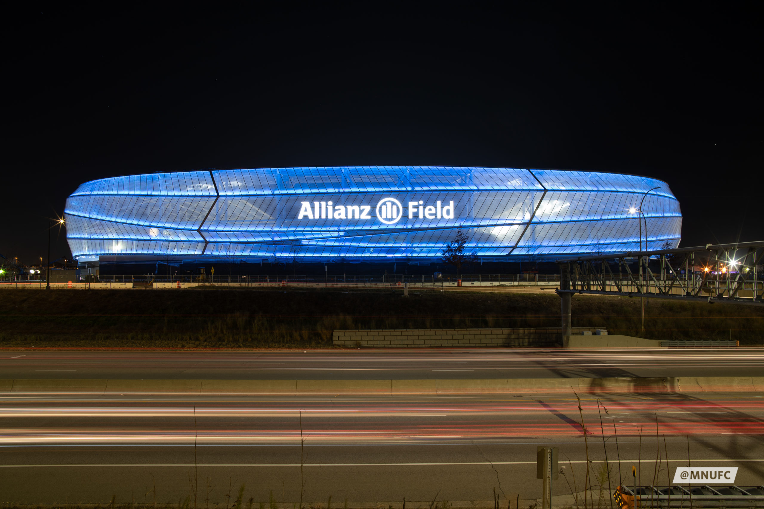Allianz Field, home of the Minnesota United, shown lit up at night.