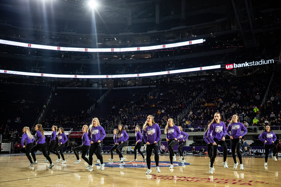 The St. Thomas Dance Team performs during a basketball game at US Bank Stadium against University of Wisconsin - River Falls on November 30, 2018, in Minneapolis.