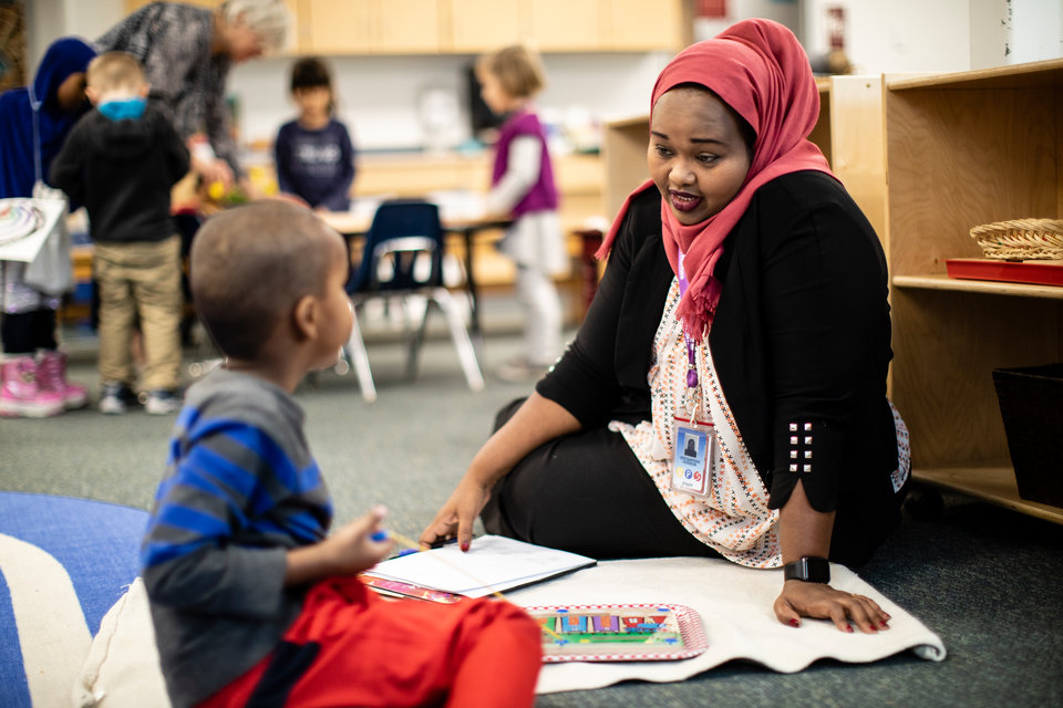 Deeqaifrah “Deeqa” Hussein observes students at Seward Montessori School in Minneapolis on December 6, 2018.