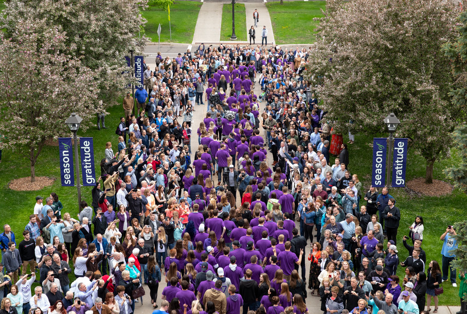 Graduating seniors March Through The Arches the day before their graduation on May 24, 2019 in St. Paul.