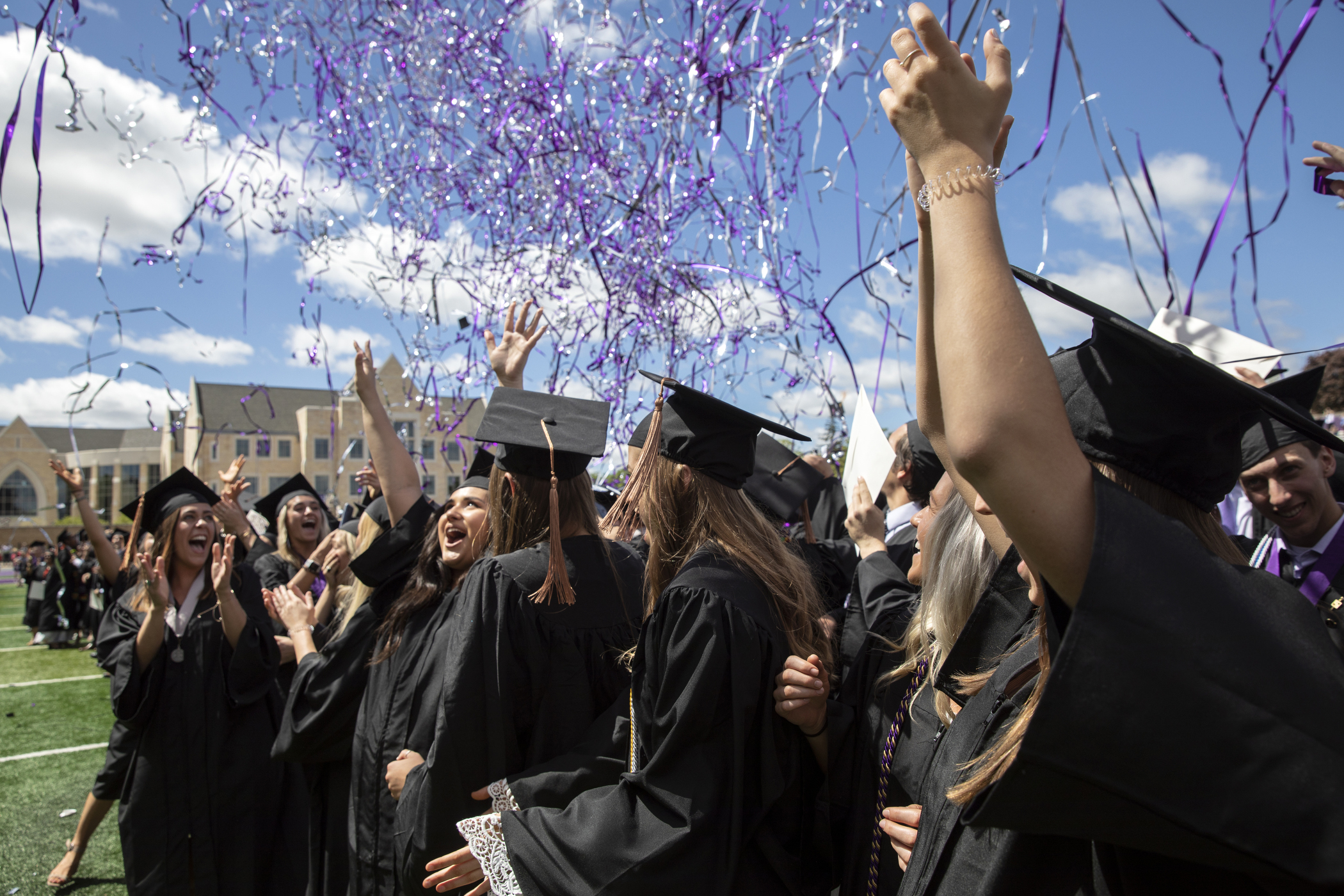 Class of 2019 graduates celebrate on May 25 as confetti launches during the undergraduate commencement ceremony.