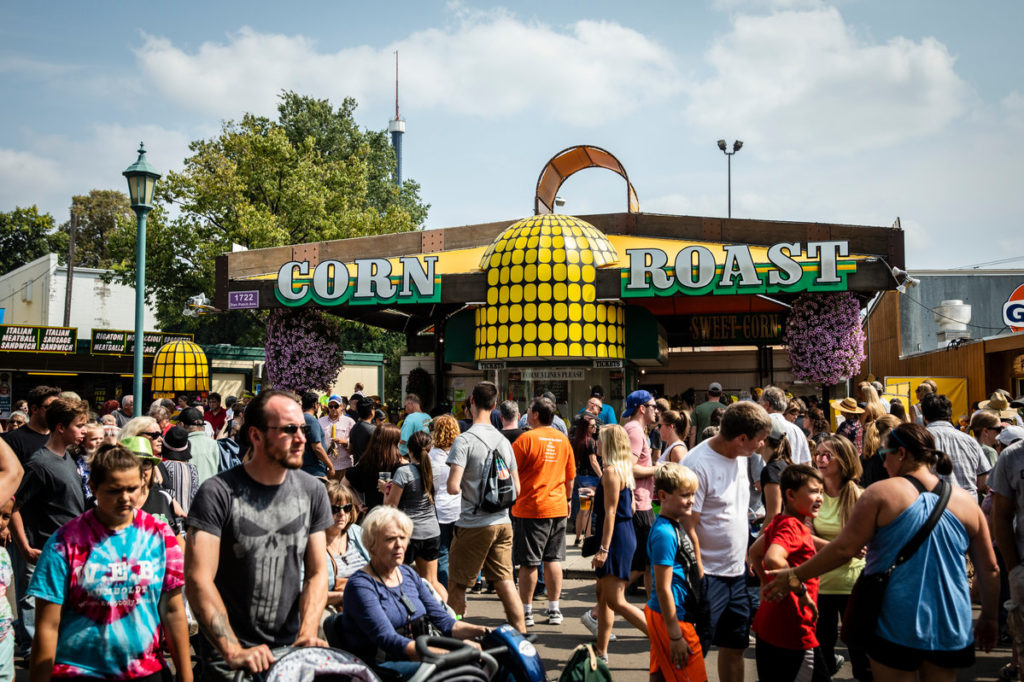 Customers gather at the Corn Roast stand at the Minnesota State Fair