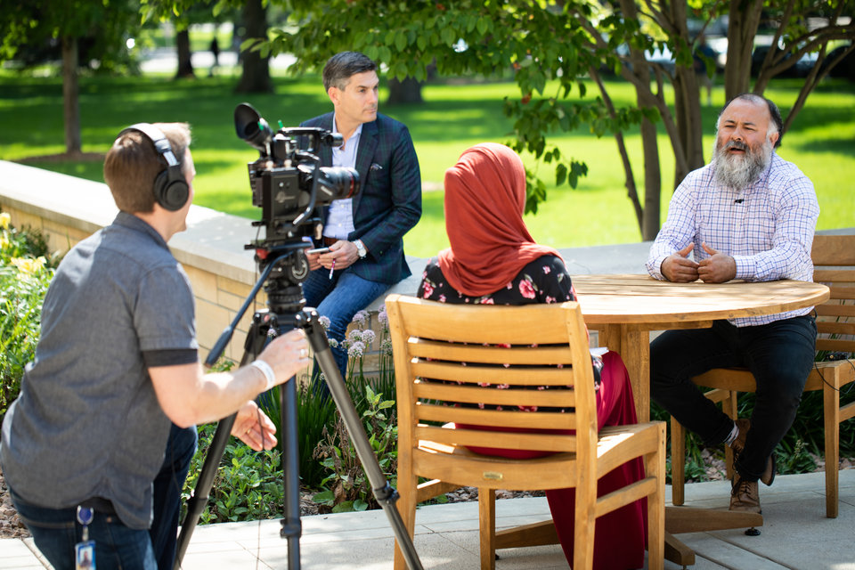 ThreeSixty Journalism students work with professional media coaches from KSTP, including anchor Paul Folger, to interview sources for news packages on July 23, 2019 in St. Paul.