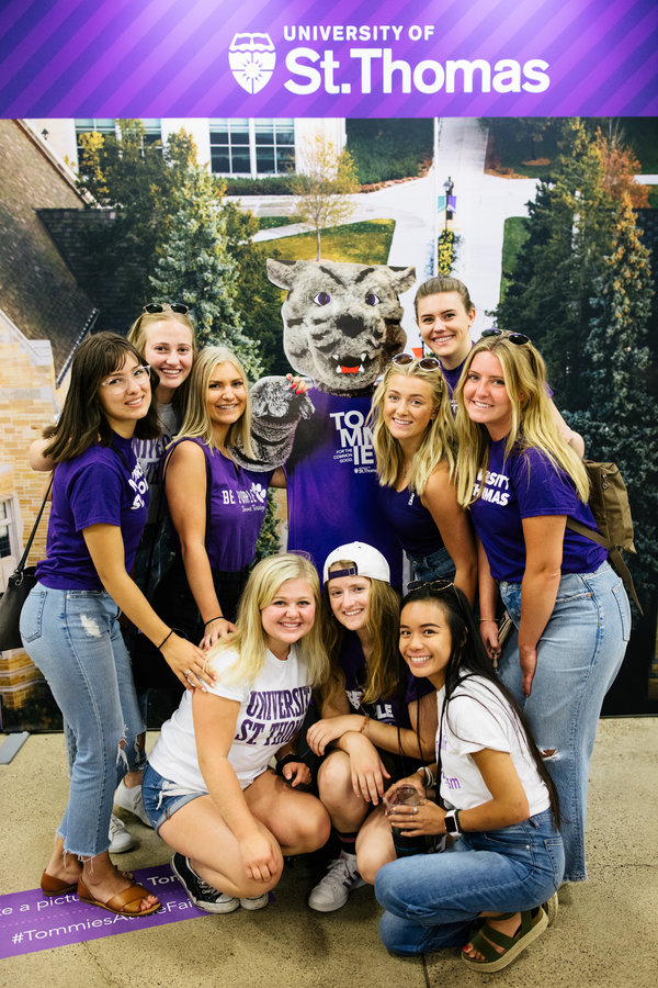 Members of Cadenza pose for a group photo with a Tommie cutout at the Minnesota State Fair on August 22, 2019 in St. Paul.