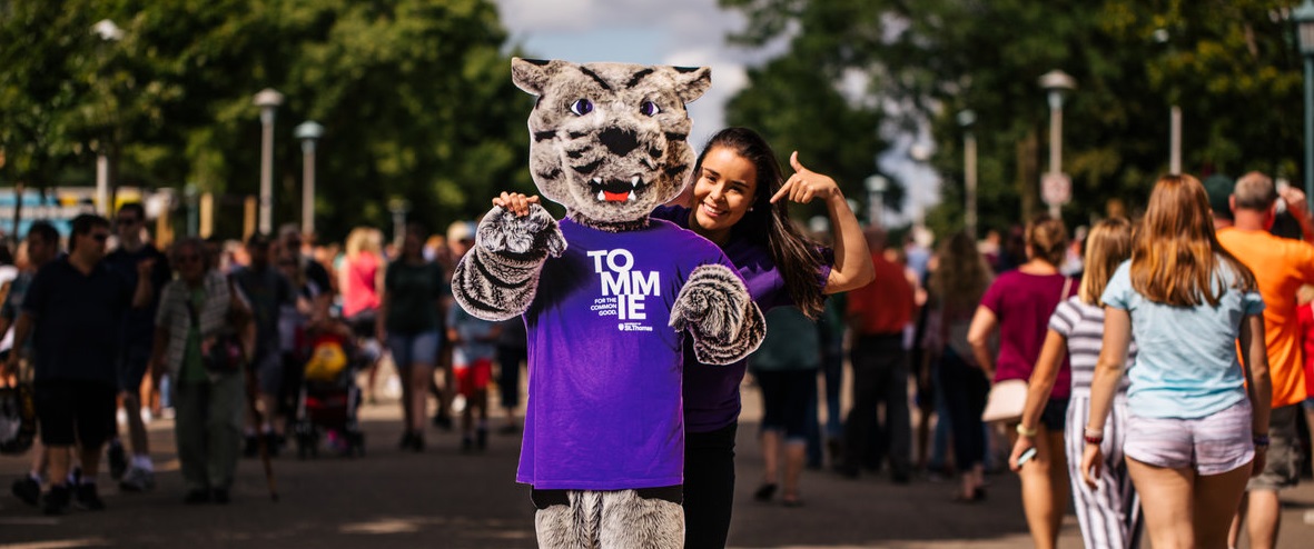 St. Thomas student Olivia Litecky poses with a Tommie cutout at the Minnesota State Fair on August 22, 2019 in St. Paul.