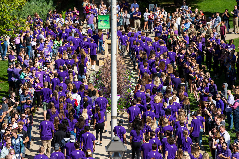 Incoming first-year students March Through the Arches to celebrate the start of their college journey and the start to the 2019 academic year on September 3, 2019, in St. Paul.