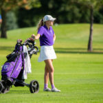Courtney Shorter navigates the course during the women’s golf Gustavus Invite at Emerald Greens golf course in Hastings.
