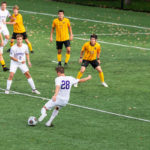 Josh Grzesiak (28) kicks the ball on the south athletic field on September 18, 2019 where the University of St. Thomas men's soccer team fell to Gustavus with a final score of 2-1.
