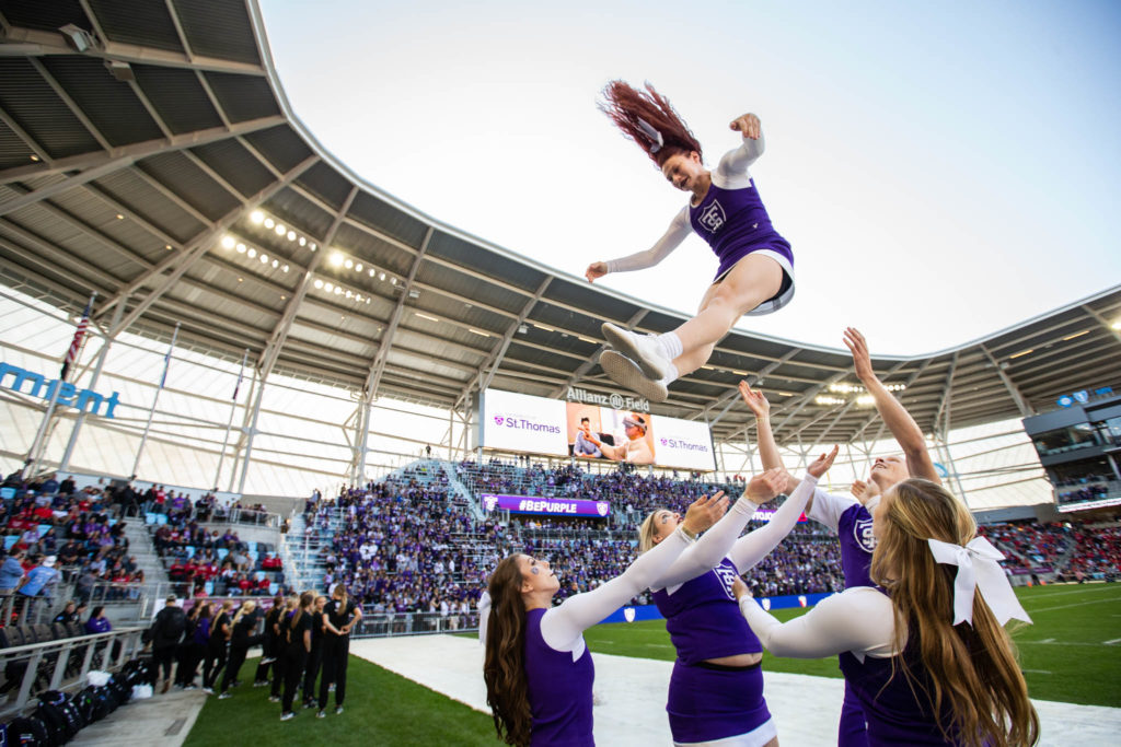 St. Thomas cheerleaders made sure the football wasn't the only thing flying through the air during the Tommie-Johnnie game.