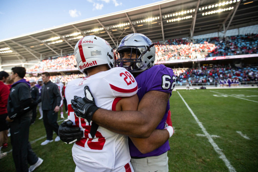 The camaraderie of the game applied to players as well as fans at the St. Thomas-St. John's football game.