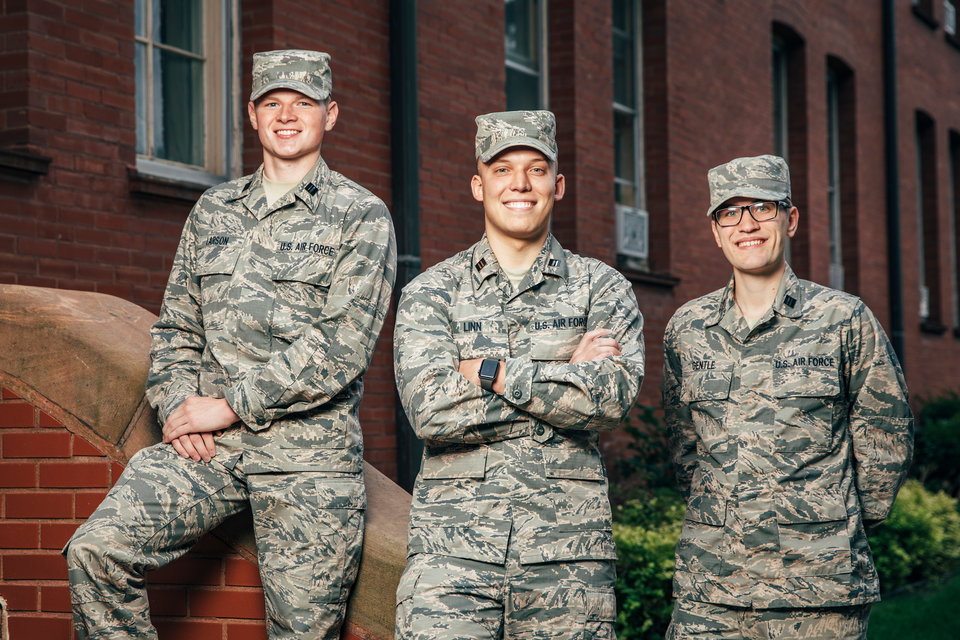 AFROTC cadets, from left, Henry Larson, David Linn and Samuel Gentle pose for a photo outside of Loras Hall in St. Paul,