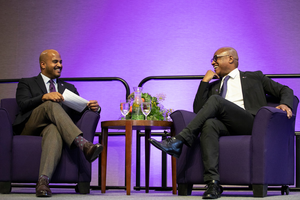 Alvin Abraham, left, dean of the Dougherty Family College, and Greg Cunningham, VP and head of diversity and inclusion at U.S. Bank, have a fireside chat style discussion during the First Friday Speaker Series. Liam James Doyle/University of St. Thomas