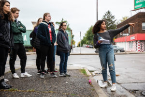 Student Tiaryn Daniels speaks during an Art History class on October 10, 2019, in St. Paul. The class was discussing the mural “Braided,” part of the Midway Murals project in the Midway Neighborhood. Mark Brown/University of St. Thomas