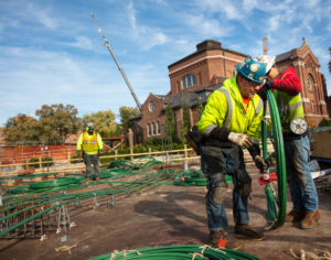 Crews work on the second year residence hall construction project on north campus on October 18, 2019, in St. Paul.