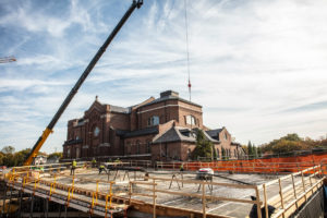 Crews work on the Iverson Center for Faith construction project surrounding Aquinas Chapel on north campus on October 18, 2019, in St. Paul.