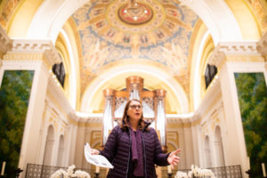 Victoria Young, Professor and Chair of Art History, speaks to members of the University of St. Thomas’ board of trustees, campus ministry, and lead donors about the renovations made to the Chapel of St. Thomas Aquinas following a construction site hard-hat tour of the Iverson Center for Faith on the St. Paul campus on November 13, 2019.