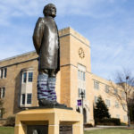 The John Ireland statue stands adorned with special socks to help celebrate and promote Tommie Give Day. Liam Doyle/University of St. Thomas