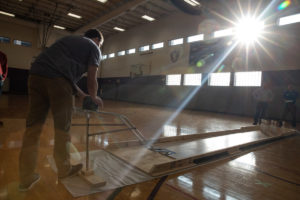 A student bowls during a concrete bowling competition between St. Thomas Civil Engineering students and students from other colleges in McCarthy Gym. Mark Brown/University of St. Thomas