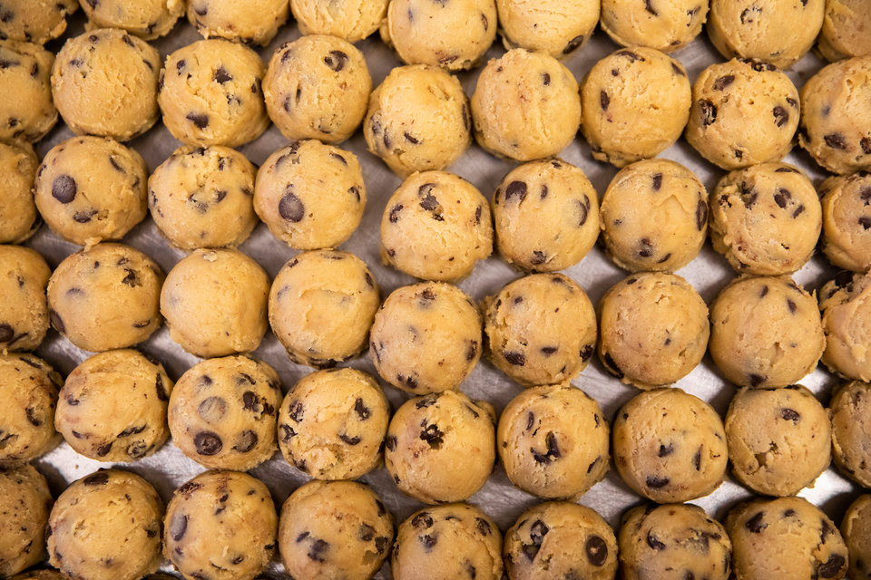 Freshly scooped balls of cookie dough sit at Cookie Cart, a bakery and non-profit that employs teenagers, providing them with leadership skills and work experience, in Minneapolis on December 19, 2019.