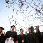 Graduates celebrate as confetti flies during the 2019 Graduate Commencement Ceremony. Mark Brown/University of St. Thomas
