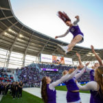 Members of the cheer team perform during the 2019 Tommie Johnnie football game at Allianz Field. Mark Brown/University of St. Thomas