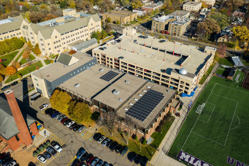 Solar panels for the Center for Microgrid Research stand atop McCarthy Gym. Mark Brown/University of St. Thomas