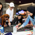 International students work on a project in the create[space]. Liam James Doyle/University of St. Thomas