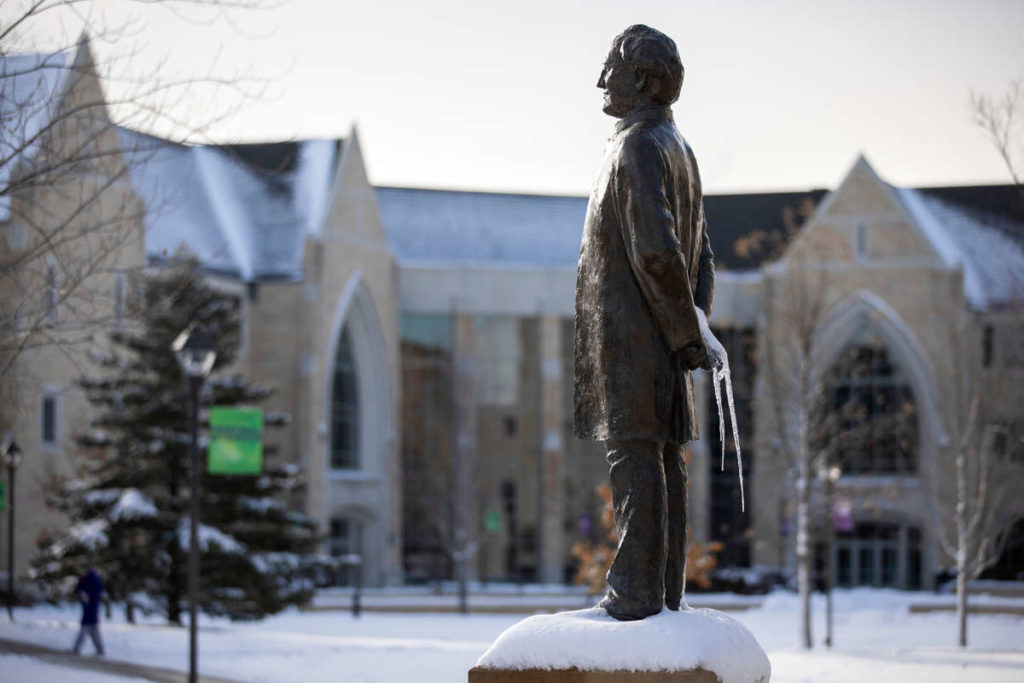 An icicle hangs from the John Ireland Statue. Liam James Doyle/University of St. Thomas