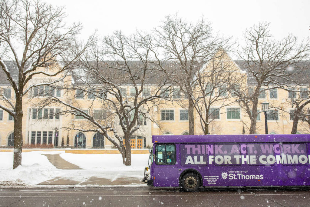 A University of St. Thomas shuttle bus on a snowy day. Mark Brown/University of St. Thomas