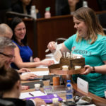 Rachel Rinehart, MBA, founder of Moody’s Ice Cream, hands out samples of her product during the St. Thomas Business Plan Competition. Mark Brown/University of St. Thomas