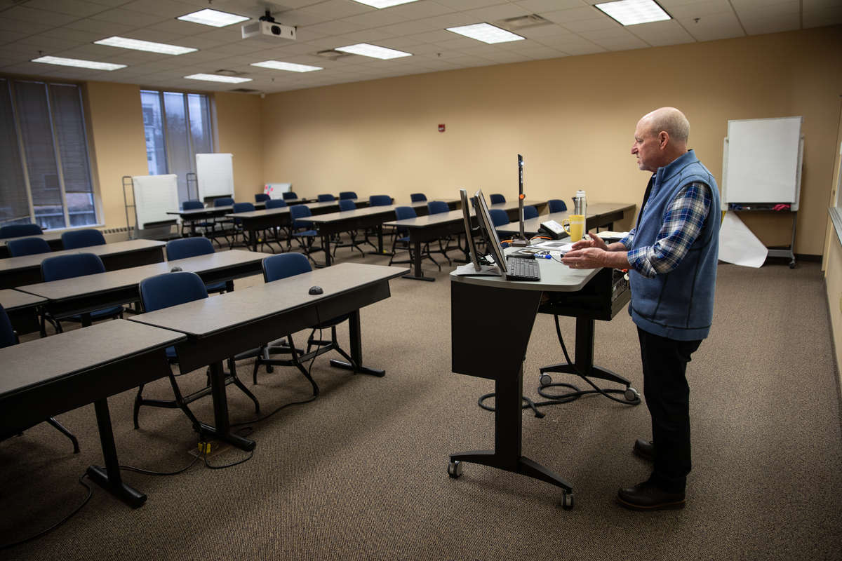 Kurt Hochfeld conducts a virtual class in an otherwise empty classroom in McNeely Hall.