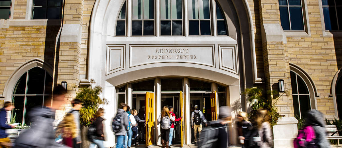 Students rush past and into the Anderson Student Center on a sunny autumn day on October 7, 2016.