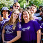 Freshmen, including Zoe Robinson (center right) pose for the camera before the March Through the Arches event September 8, 2016.