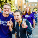 Students Eli Button (left) and Ellie Davenport smile for the camera during the March Through the Arches September 8, 2016.