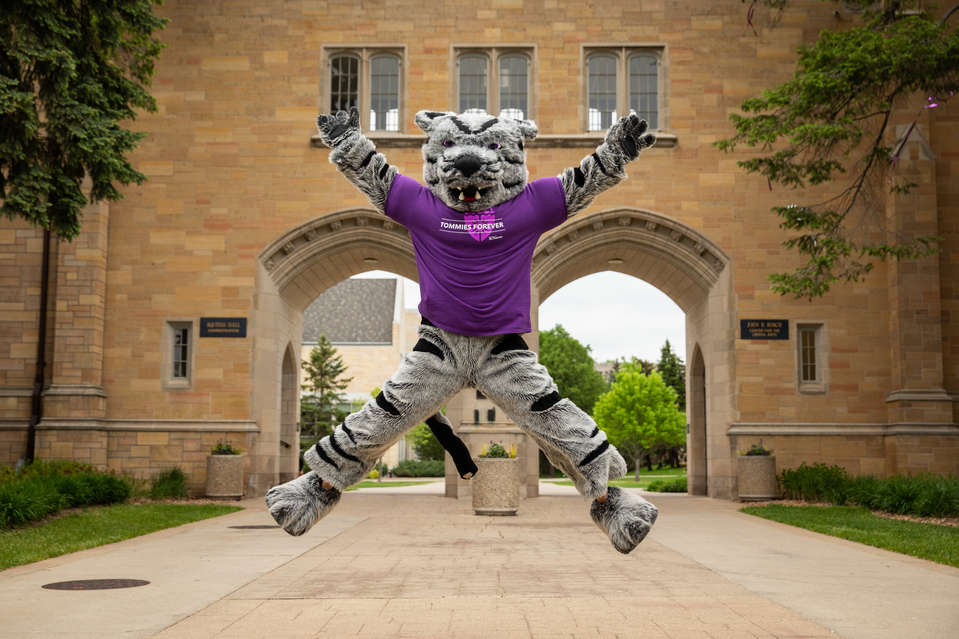 Tommie the mascot poses for a photo in front of the Arches in St. Paul on May 22, 2020.
