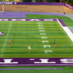 Students play football while social distancing in O'Shaughnessy Stadium. Mark Brown/University of St. Thomas
