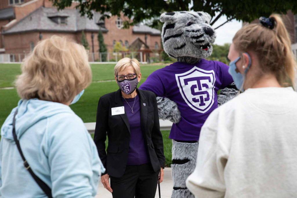 President Julie Sullivan talks with incoming students.