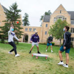 Students play Spike Ball outside on the lower quad. Liam James Doyle/University of St. Thomas