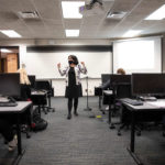 Professor Monica Hartmann teaches and Economics class in O’Shaughnessy Education Center. Mark Brown/University of St. Thomas