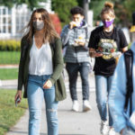 Students walk to class while wearing masks on the St. Paul campus. Mark Brown/University of St. Thomas