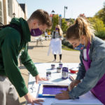 Students participate in Create Your Own Spirit Wear on Monahan Plaza as part of Homecoming Week. Mark Brown/University of St. Thomas