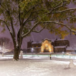 Aquinas Chapel and the Iversen Center for Faith lit up at night with lighting and lights during the first big snowfall of the year. Mark Brown/University of St. Thomas